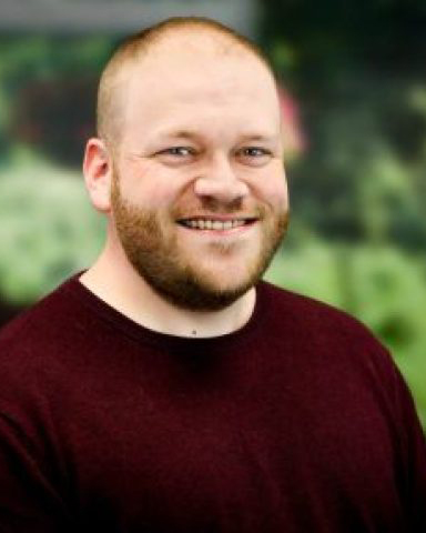 Zack_Color-scaled-e1673544803969-720x480 Zack Benz headshot