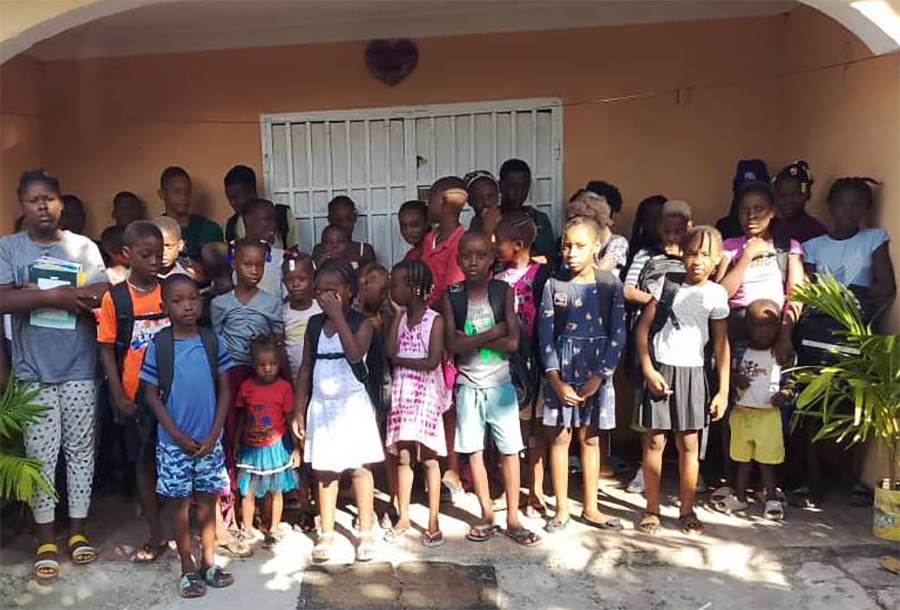 Students in Pasquette after receiving their backpacks and supplies