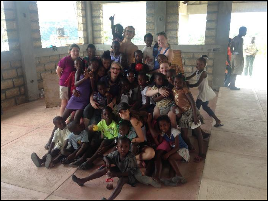 A group of St. Andrew missionaries, including Joan’s daughters, and Pasquette children in 2016
