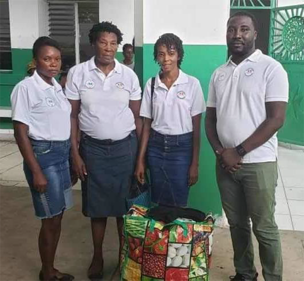 Kerlange, Armstrong and a few members of their team at the hospital