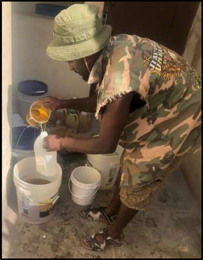 2026-01-20 15_39_02-Shell Handwriting Canvas Joseph puts together boxes of food for a Christmas package distribution
