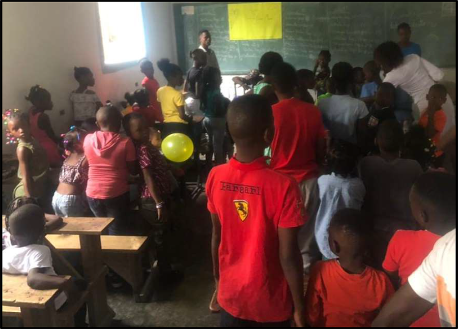 Volunteers lead activities at the kids club