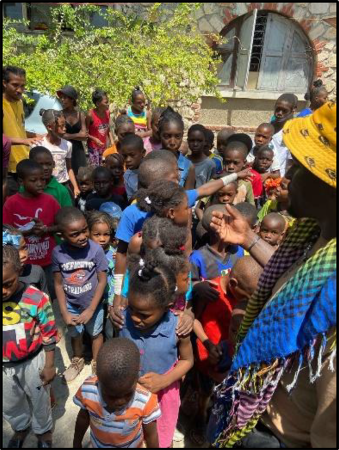 Joseph with Kids Club attendees this spring