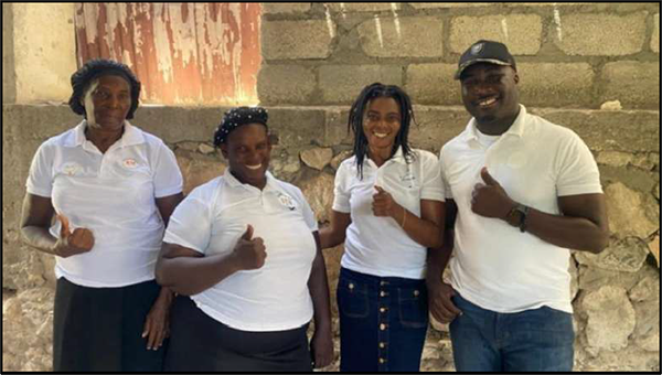 Kerlange, Armstrong and a few of their team members