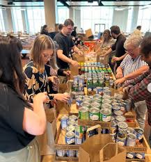 PROP volunteers assembling food donations