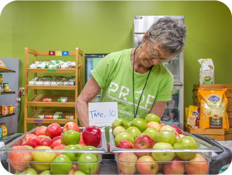 woman serving apples