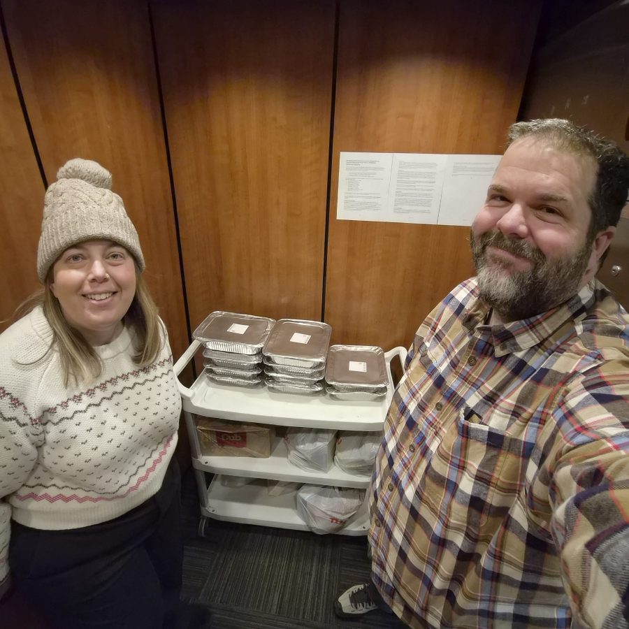 Paul and Rachel Lareau serving food