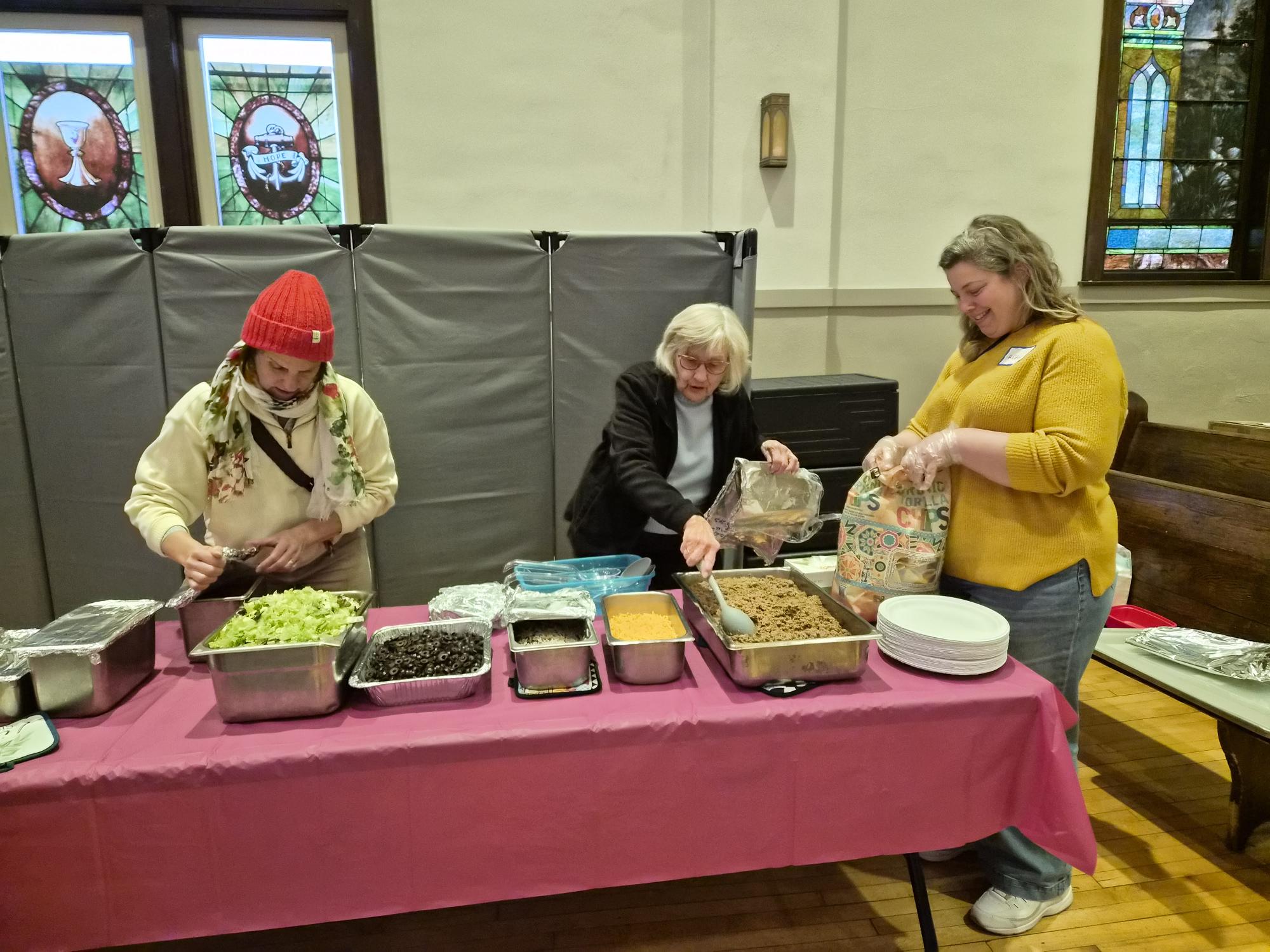 Volunteers getting ready to serve meals in Minneapolis